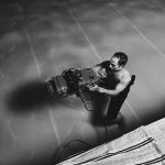 Underwater Camera Operator Nathan Frost preparing for a shot in Gold Coast , Queensland Australia.